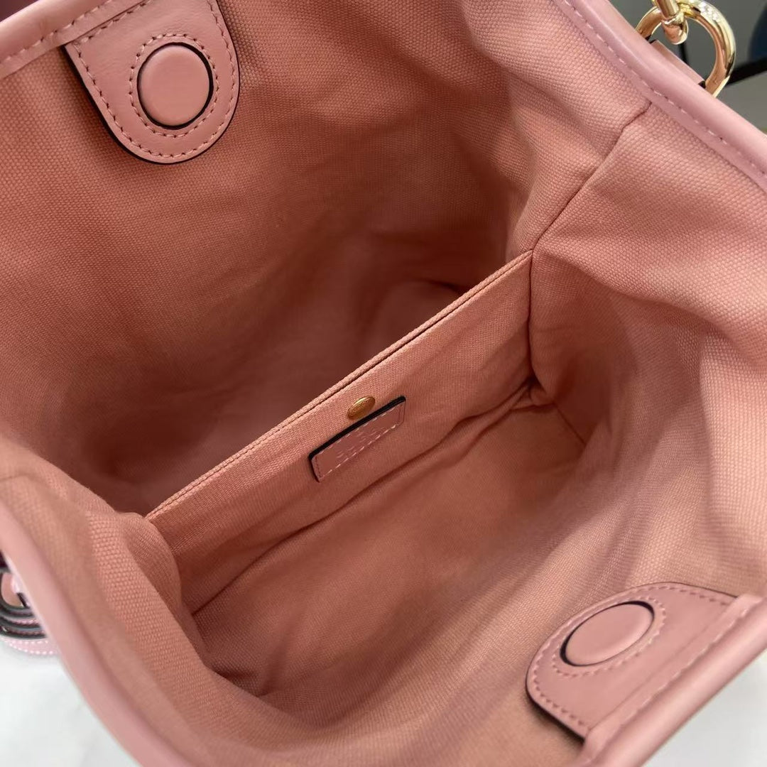 Gucci GG Emblem small bucket bag