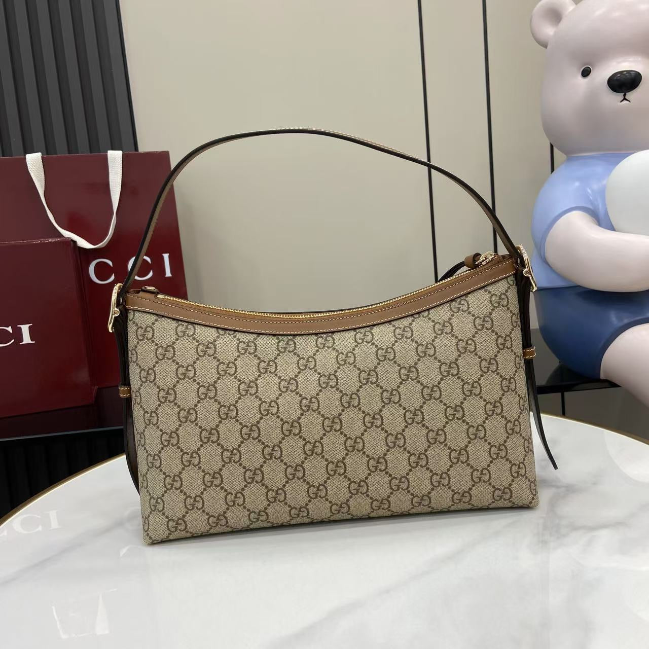 Gucci Medium Emblem Canvas bag