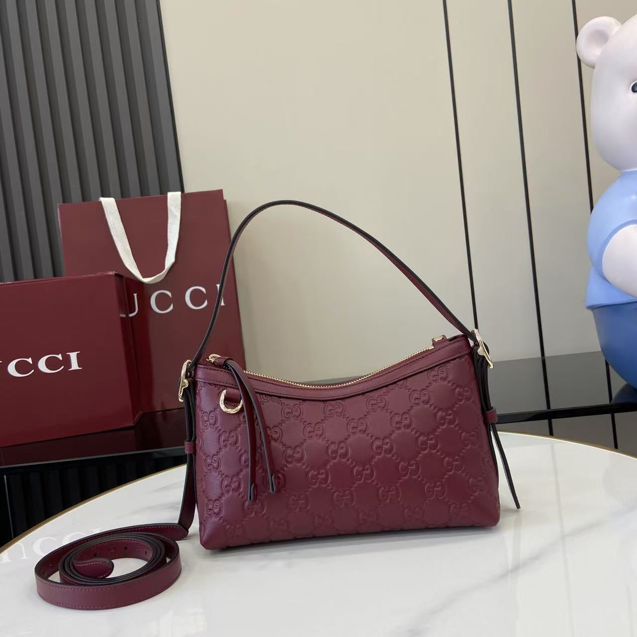 Gucci Small Emblem leather bag
