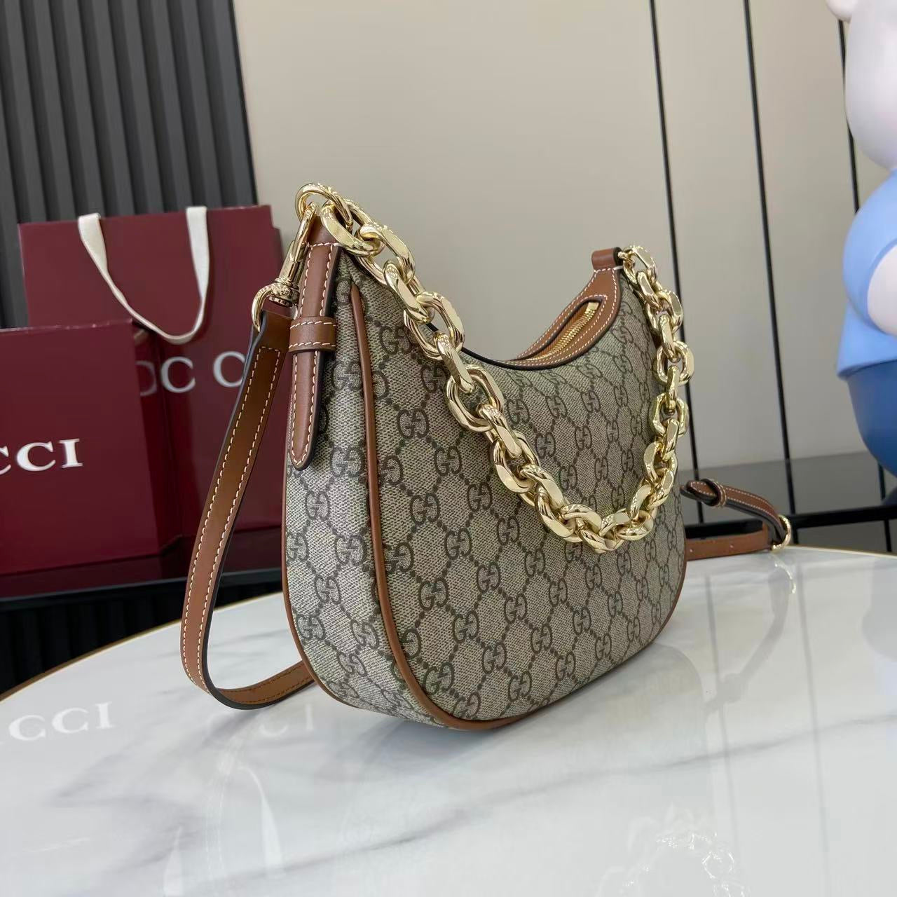 Gucci Emblem small shoulder bag