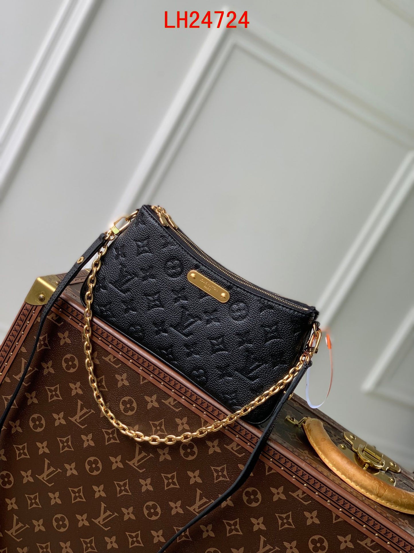 Louis Vuitton Liv Pochette empreinte leather