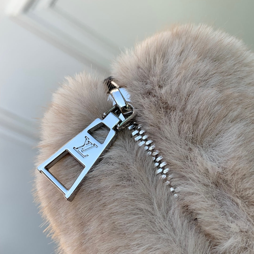 Louis Vuitton Pochette Hills Teddy bag