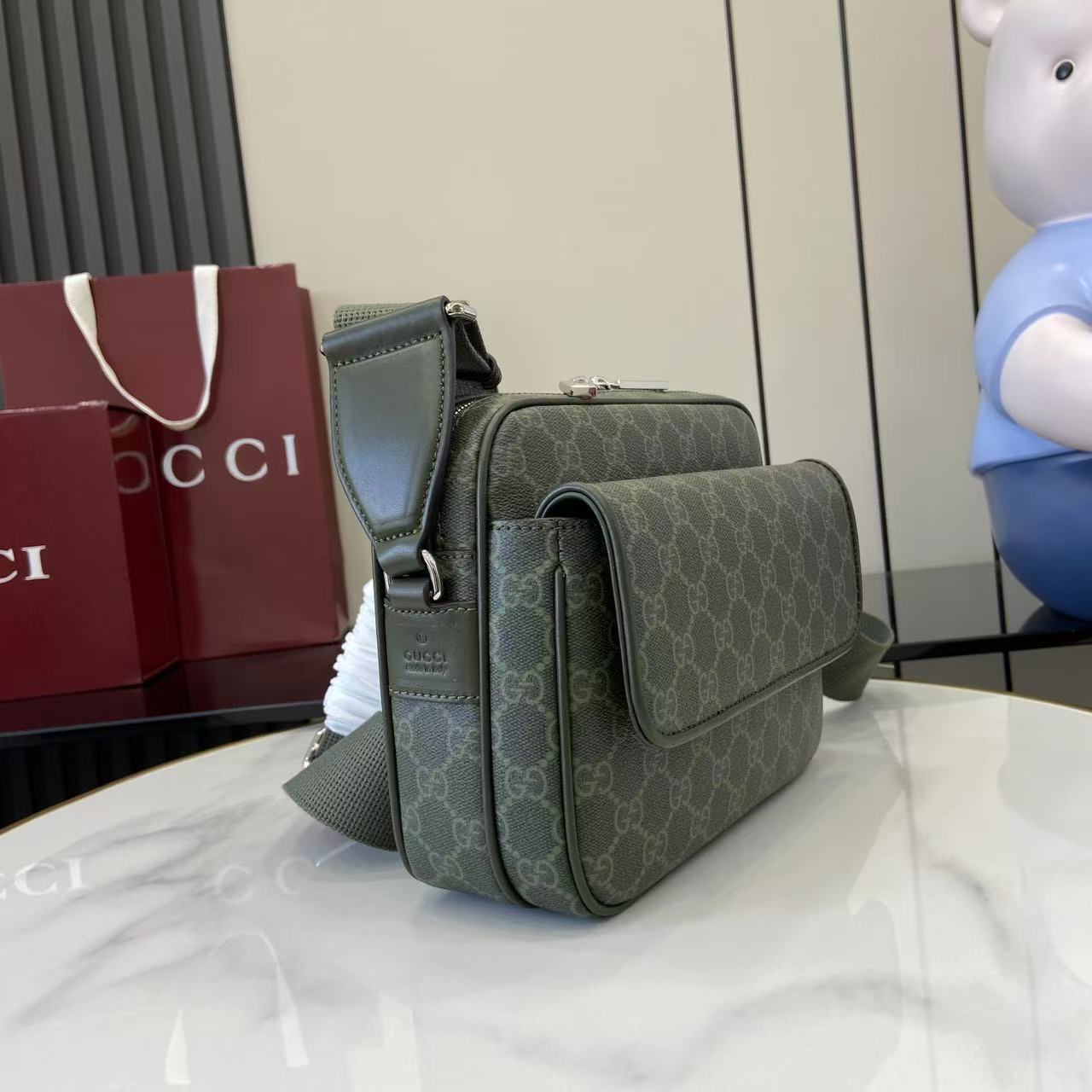 Gucci GG Monogram small crossbody bag