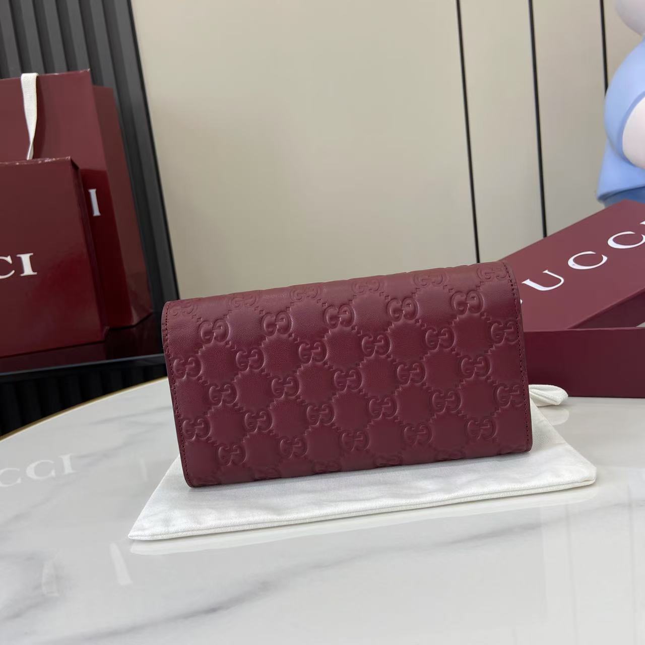 Gucci GG Emblem continental wallet