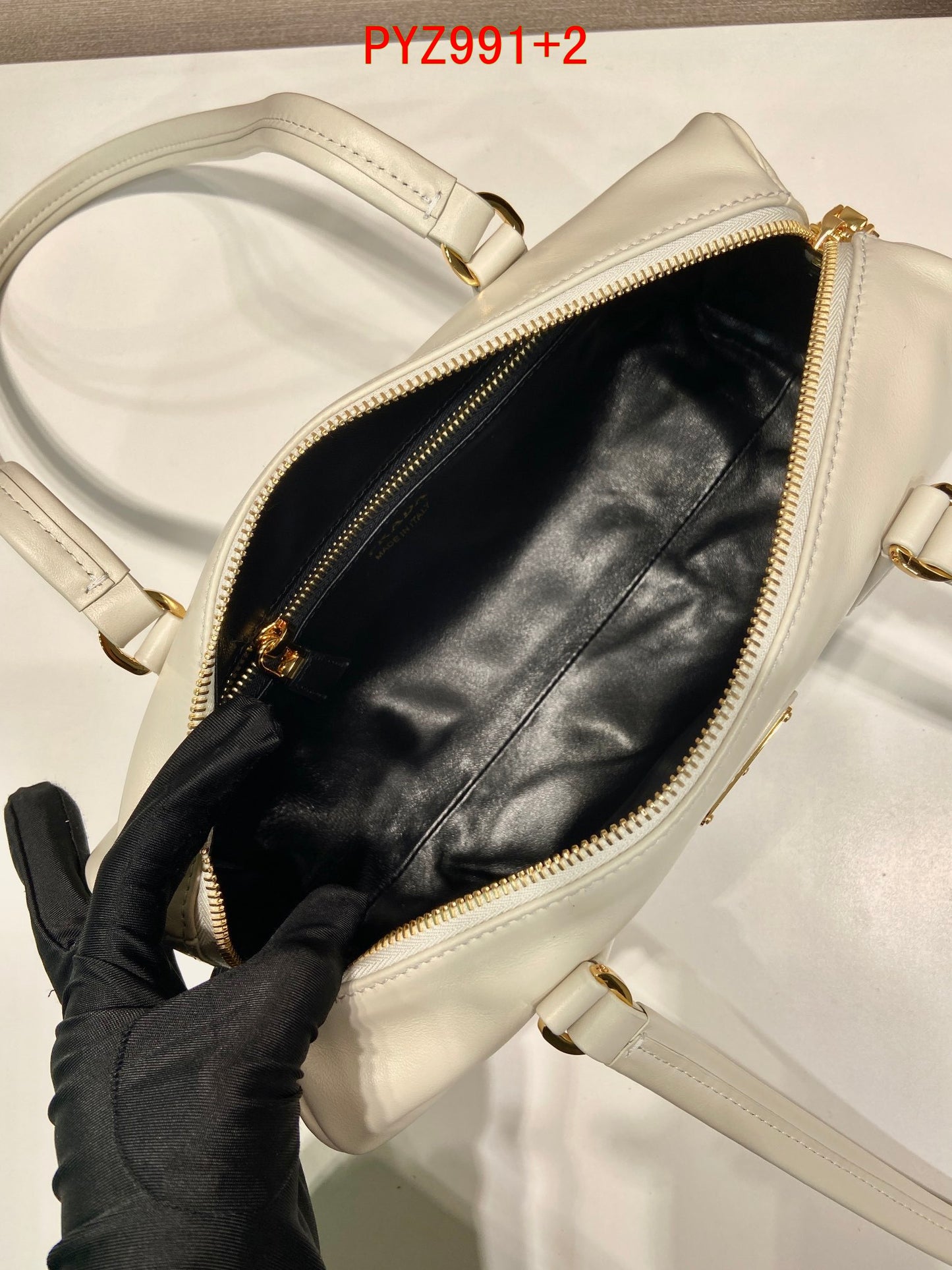 Prada leather medium top-handle bag with padlock