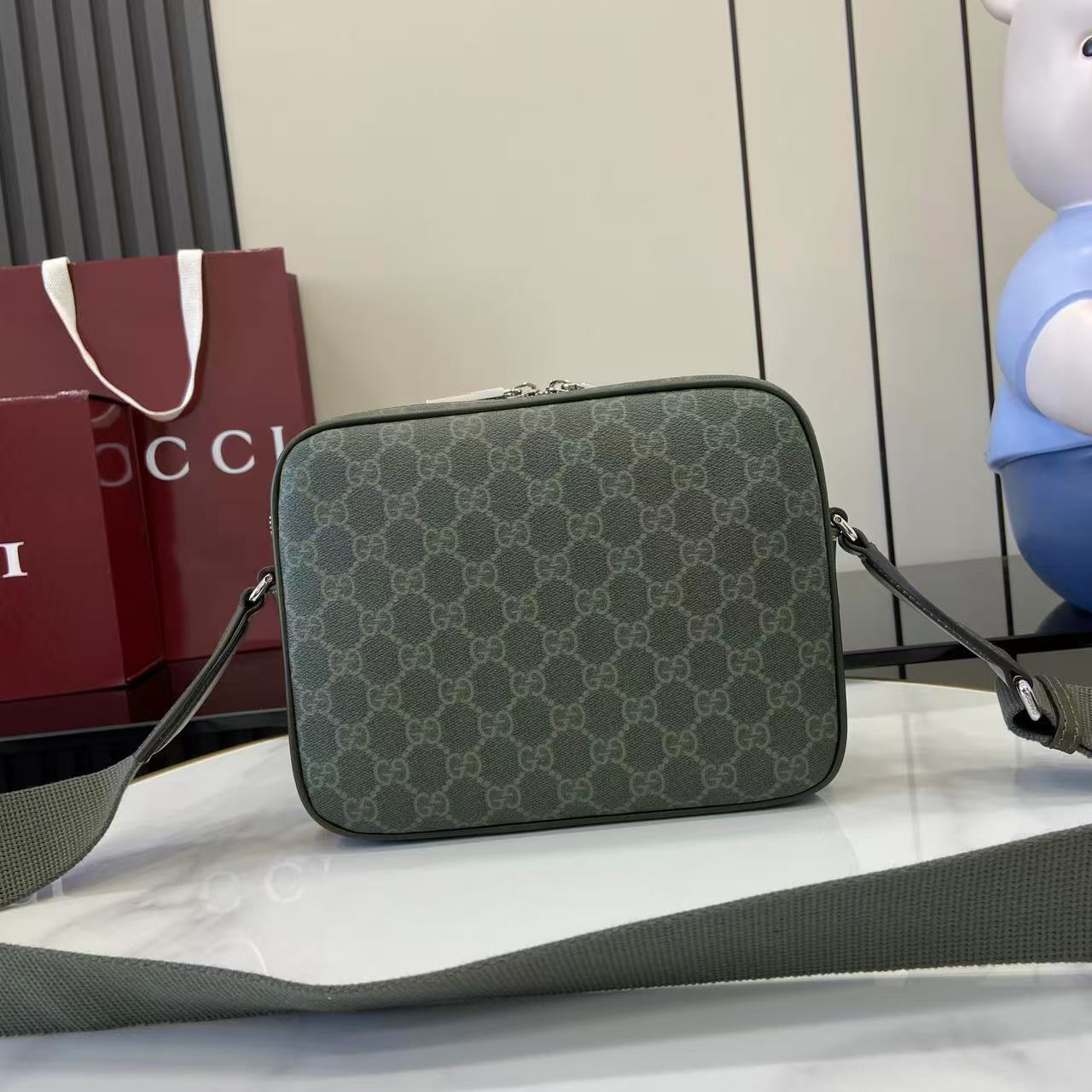 Gucci GG Monogram small crossbody bag