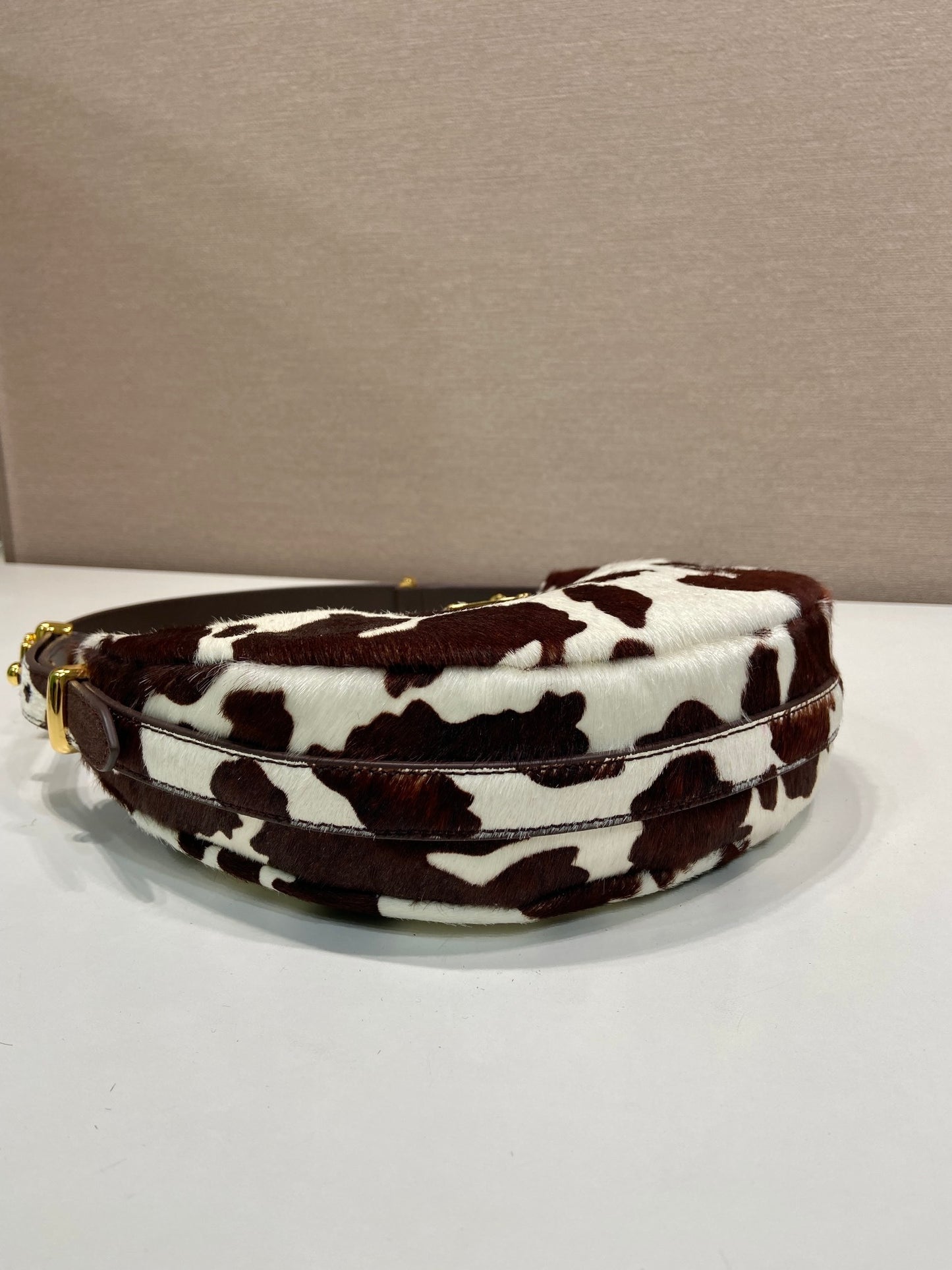 Prada Arqué printed leather mini hobo shoulder bag