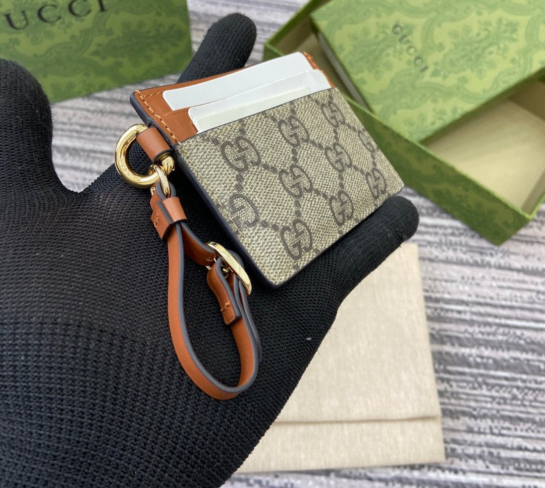 Gucci GG Emblem card case with strap