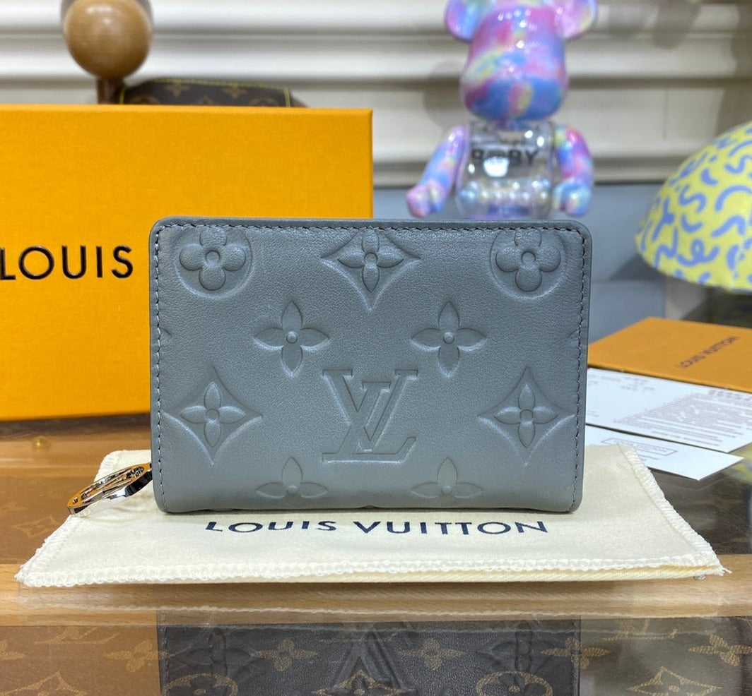 Louis Vuitton Lou Coussin Wallet