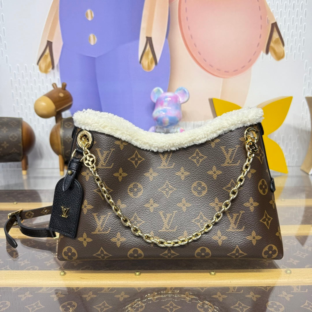Louis Vuitton CarryAll BB shearling trim