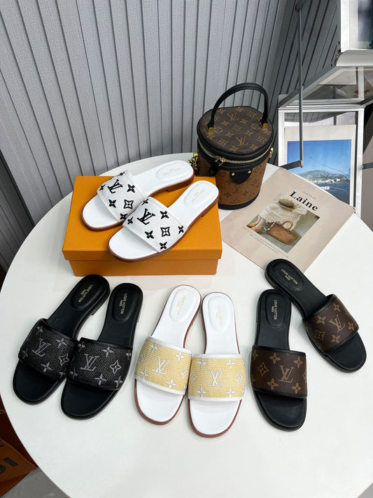 Louis Vuitton Straw Slides