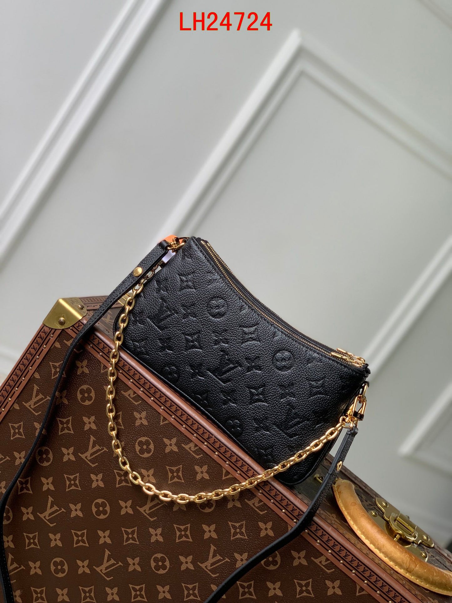 Louis Vuitton Liv Pochette empreinte leather