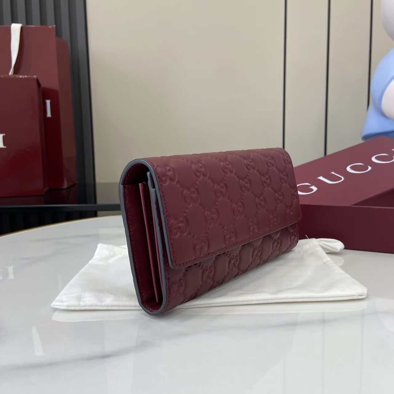 Gucci GG Emblem continental wallet