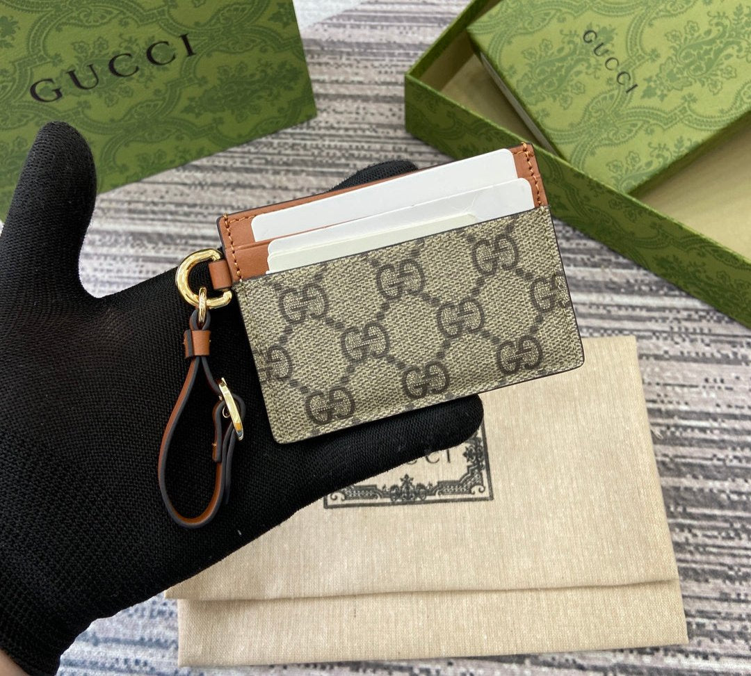 Gucci GG Emblem card case with strap