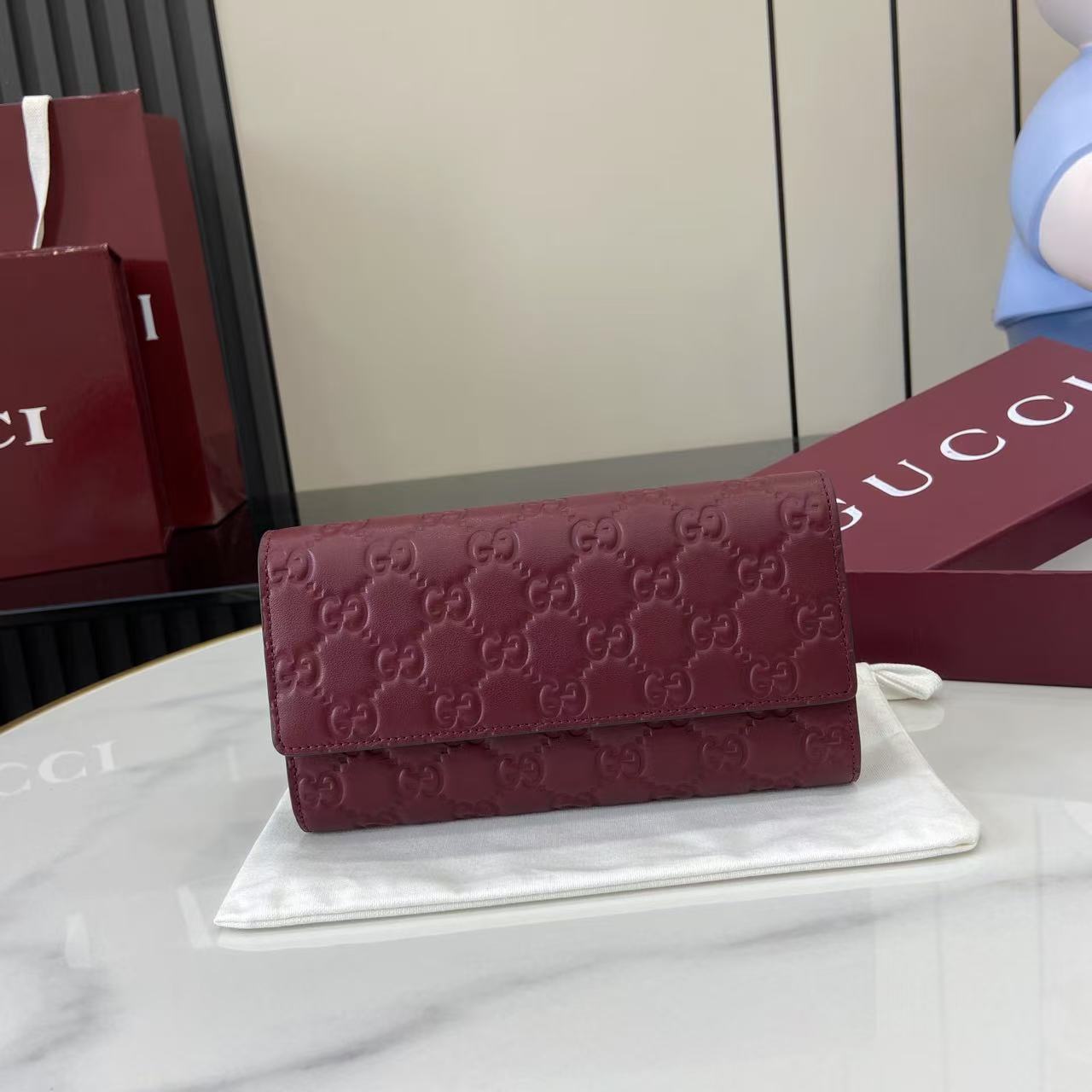 Gucci GG Emblem continental wallet