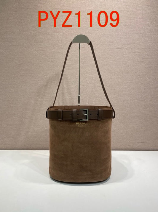 Prada Buckle suede bucket bag with jeweled belt