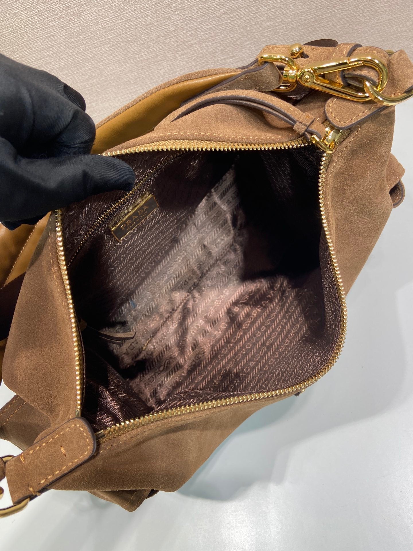 Prada Explore large suede bag