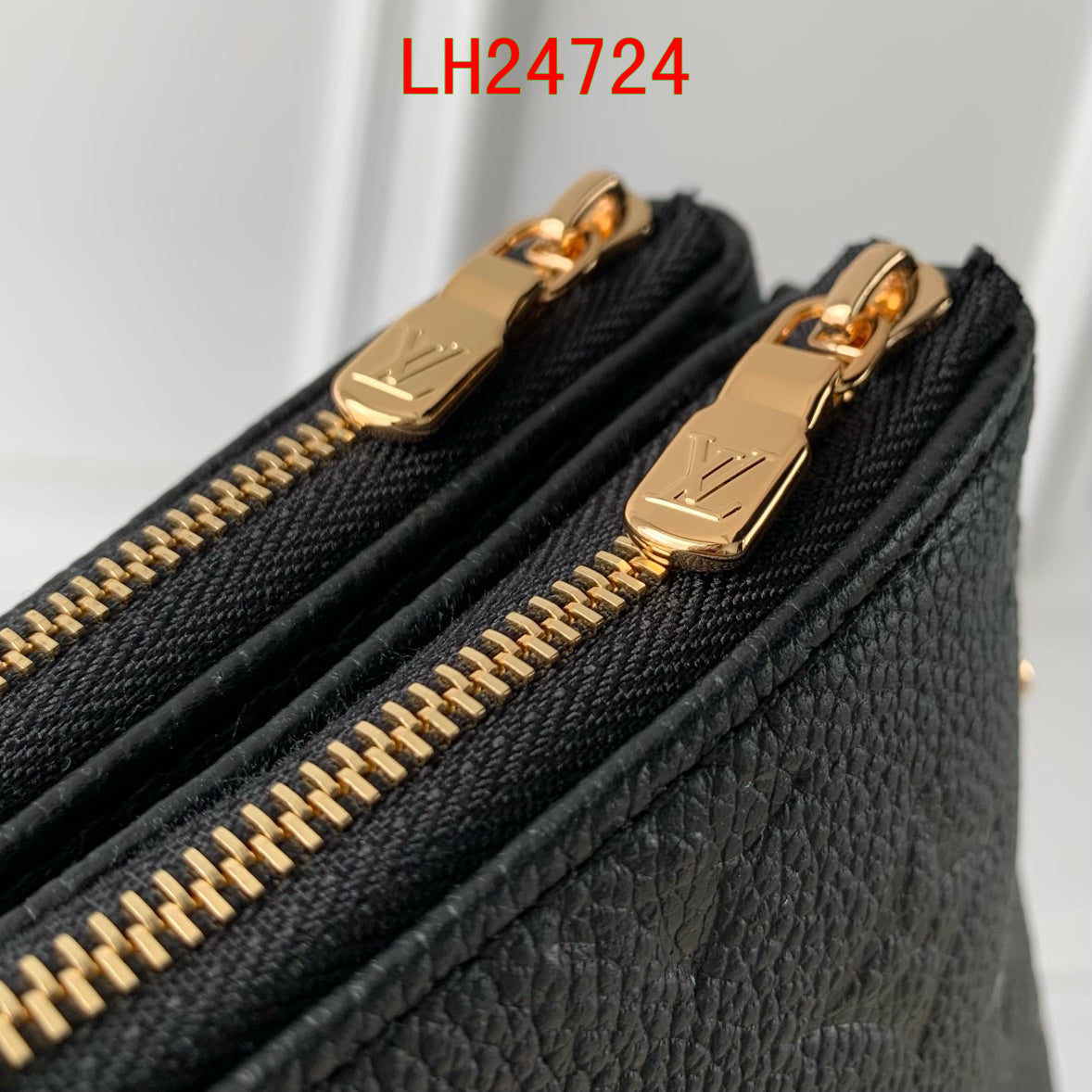 Louis Vuitton Liv Pochette empreinte leather