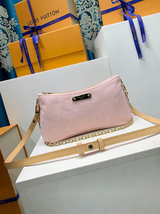 Louis Vuitton Liv Pochette denim pink