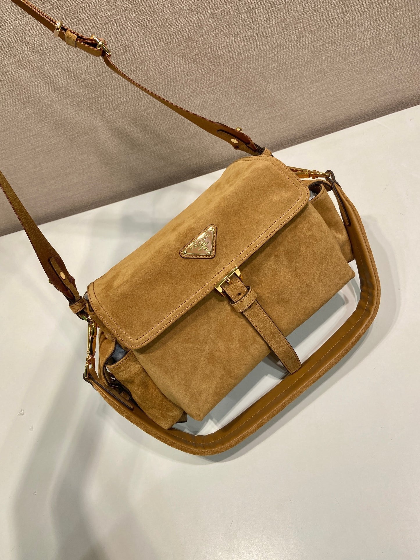 Prada Explore medium suede shoulder bag with fla