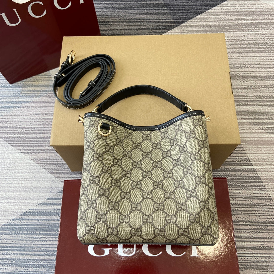 Gucci GG Emblem mini bucket bag