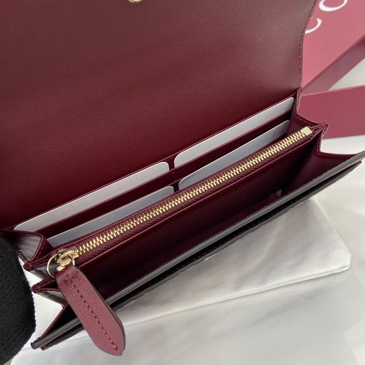 Gucci GG Emblem continental wallet