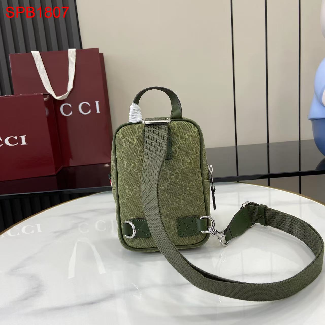 Gucci GG canvas mini slingbag
