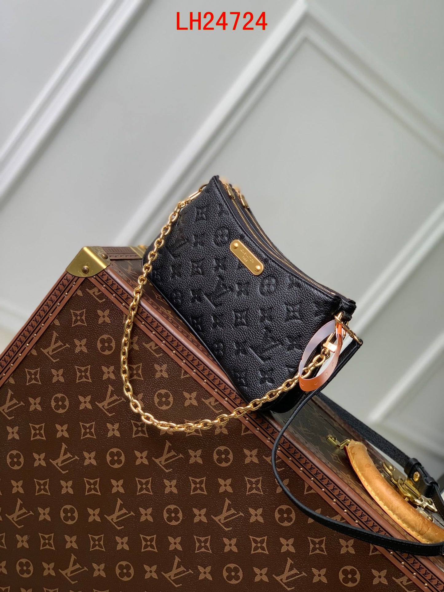 Louis Vuitton Liv Pochette empreinte leather