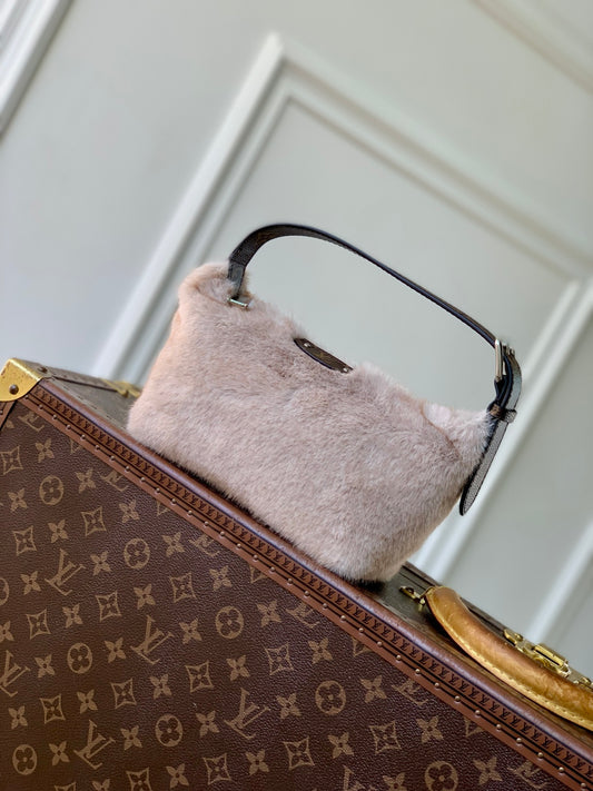 Louis Vuitton Pochette Hills Teddy bag