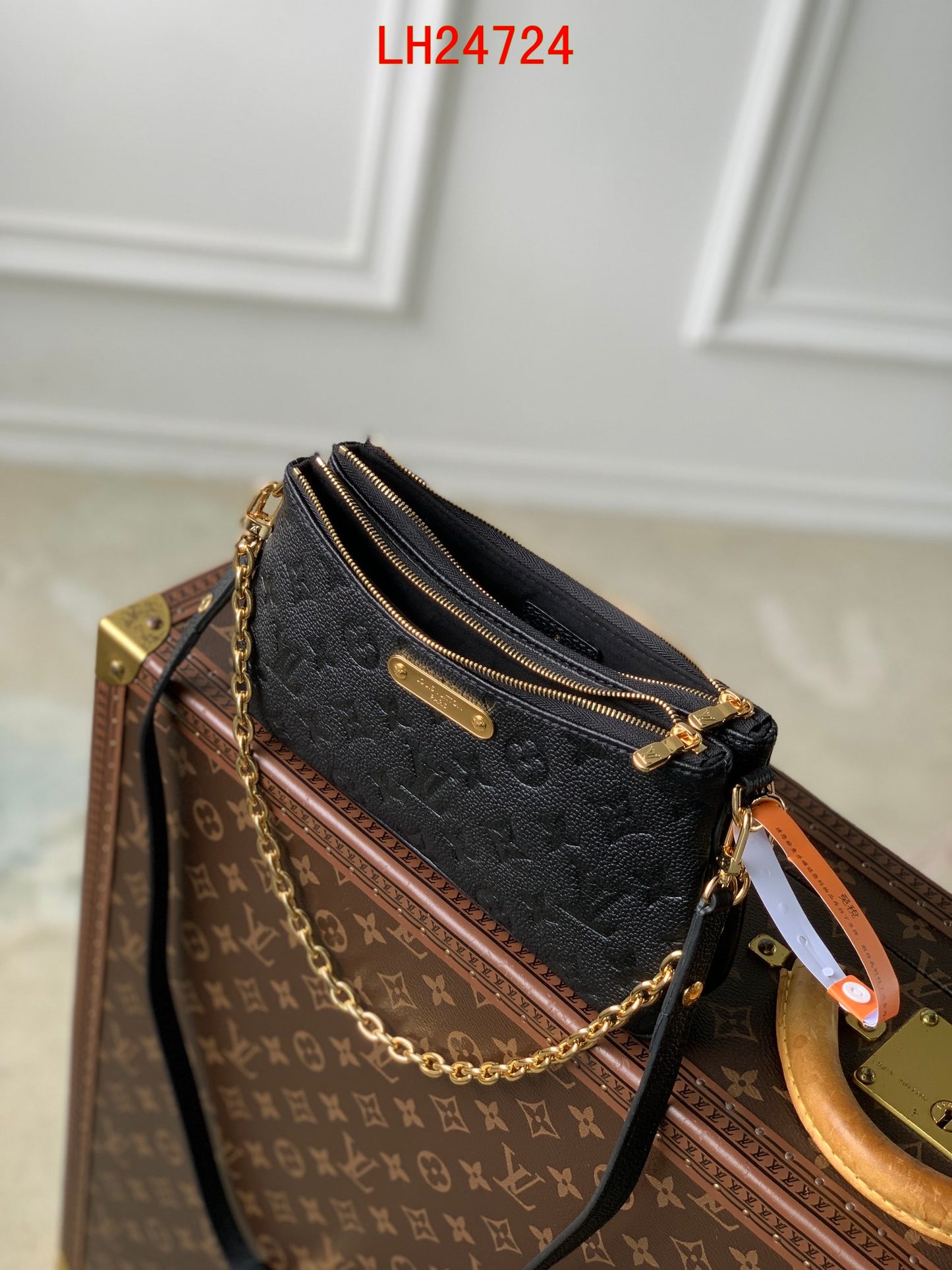 Louis Vuitton Liv Pochette empreinte leather