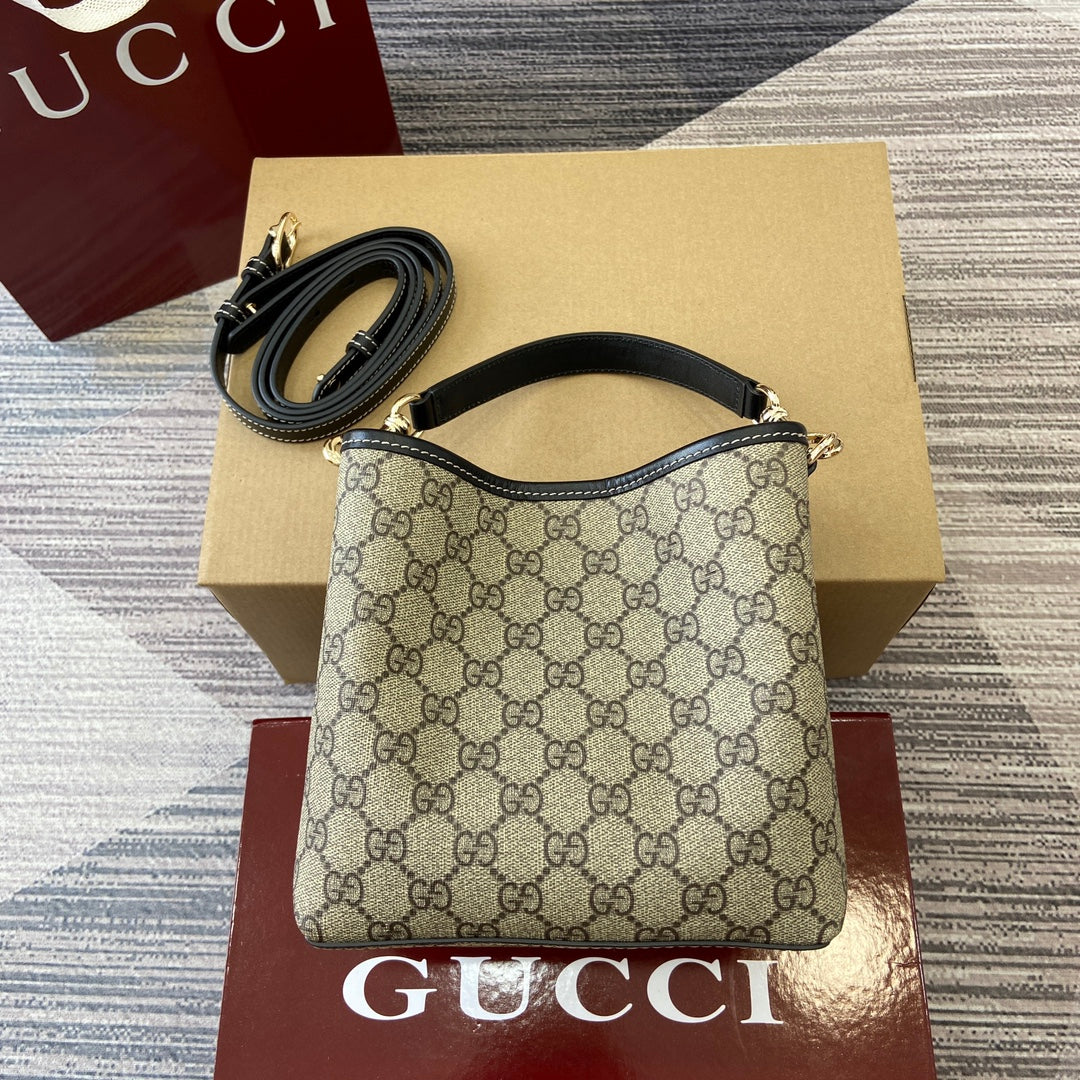 Gucci GG Emblem mini bucket bag