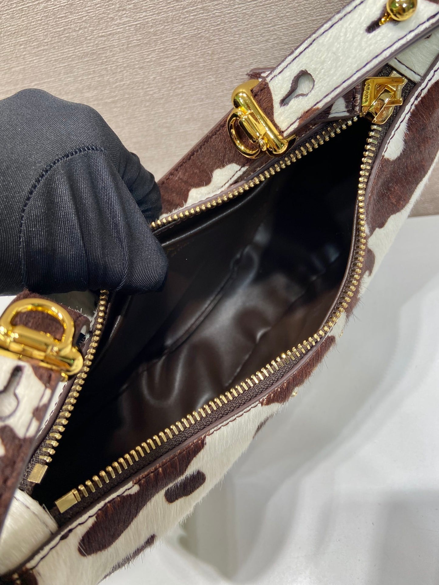 Prada Arqué printed leather mini hobo shoulder bag