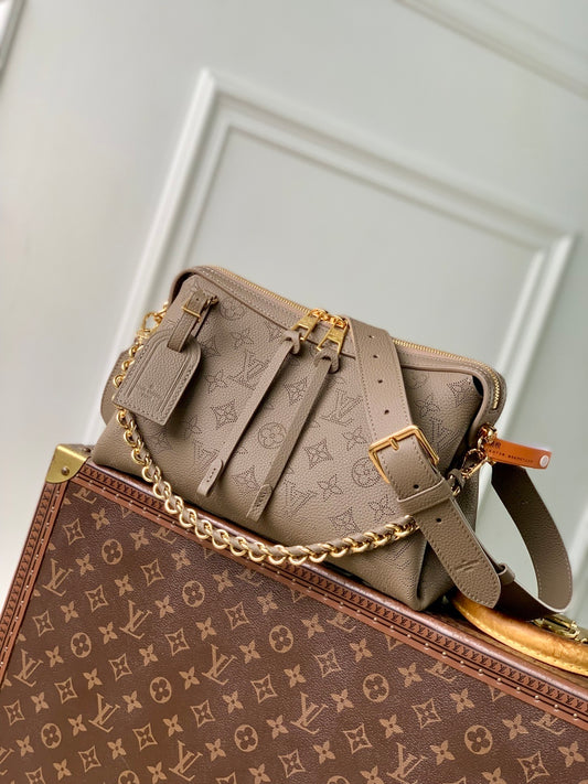 Louis Vuitton Mahina Hand It All
