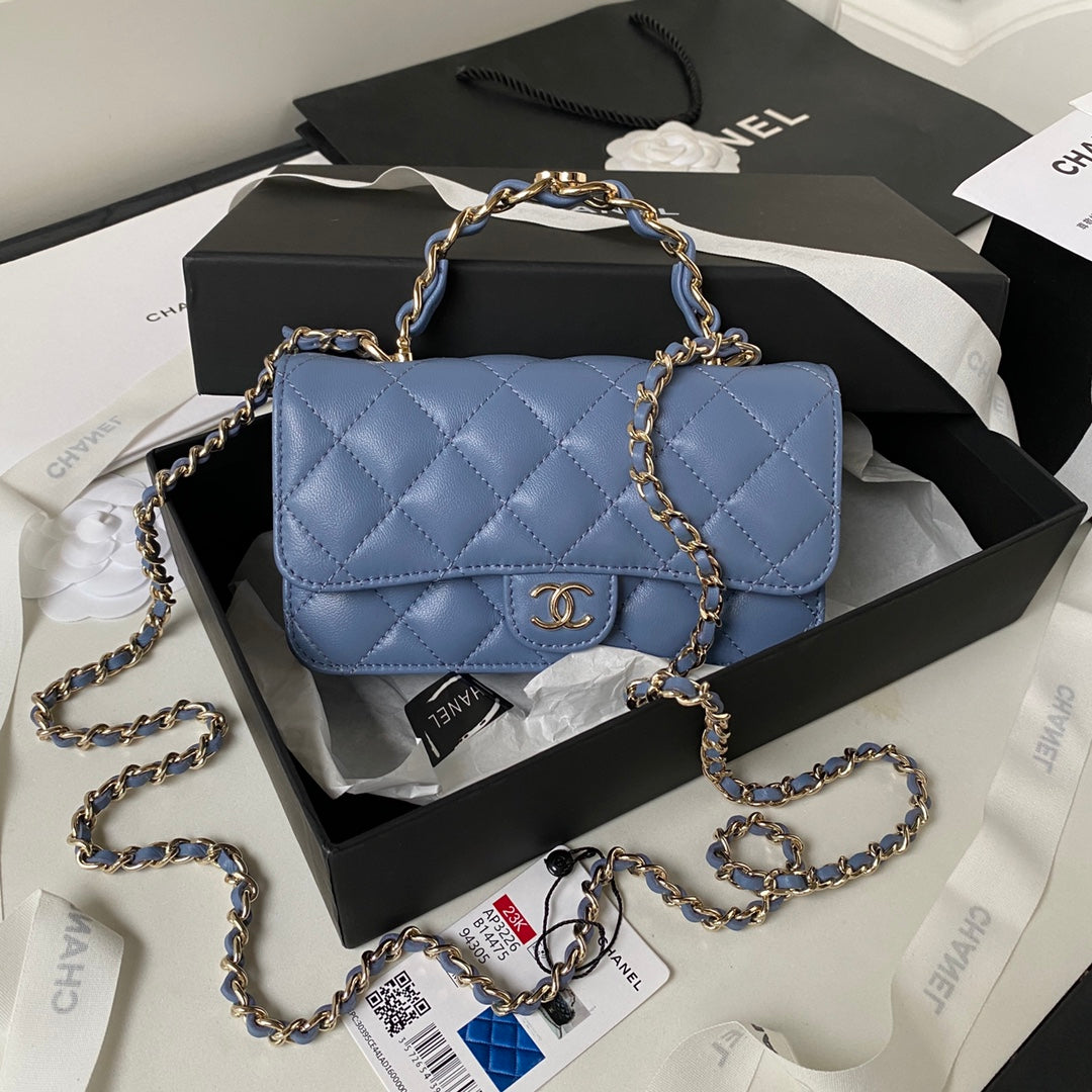 Chanel top handle flap bag