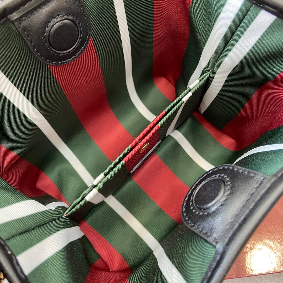 Gucci GG Emblem mini bucket bag