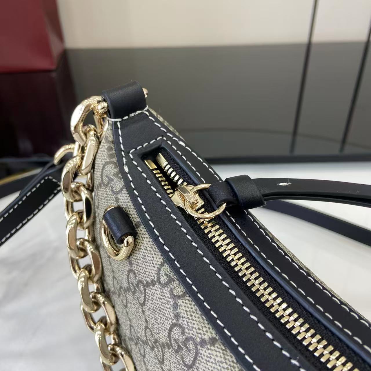 Gucci Emblem small shoulder bag with chain