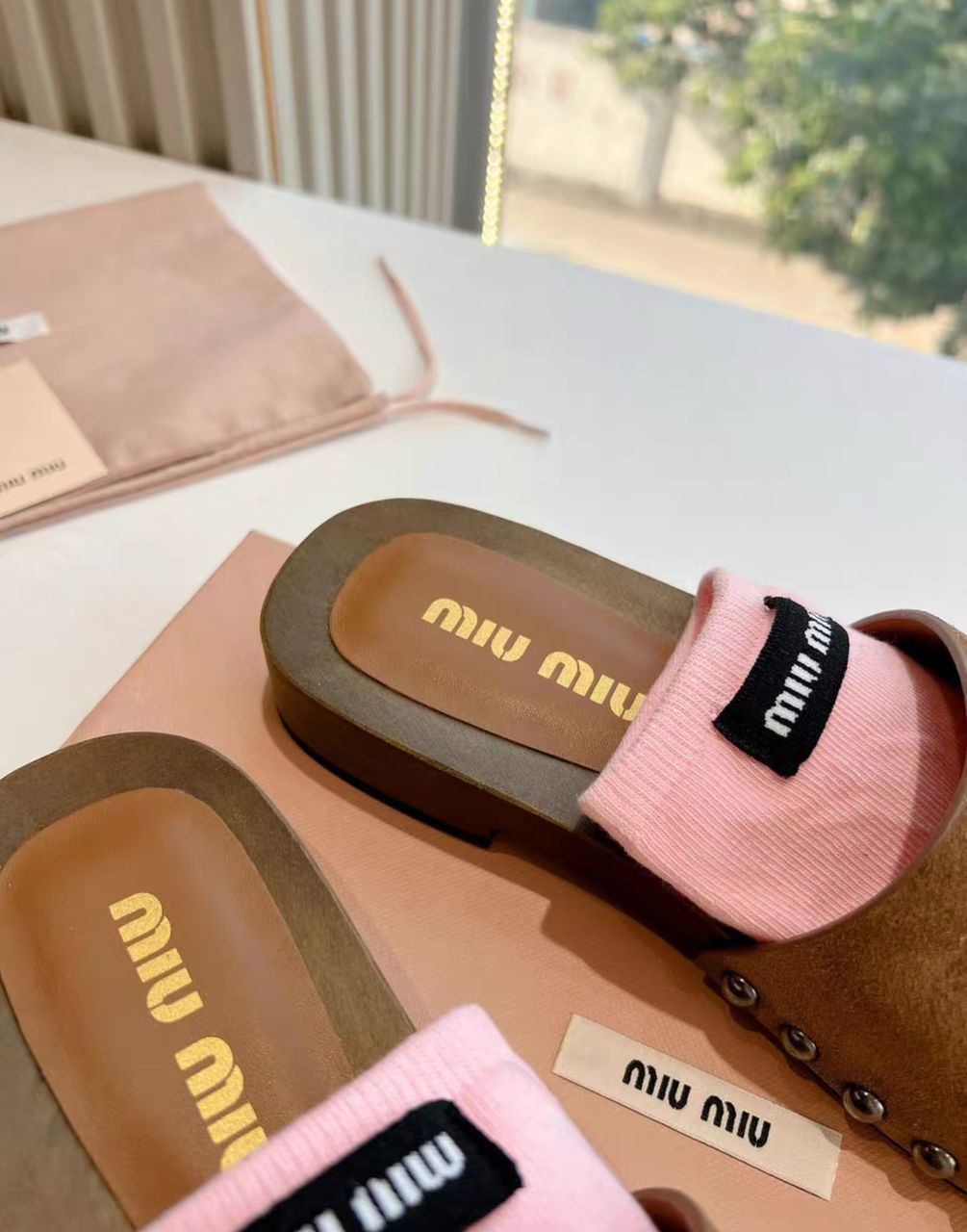 Miu Miu Slides