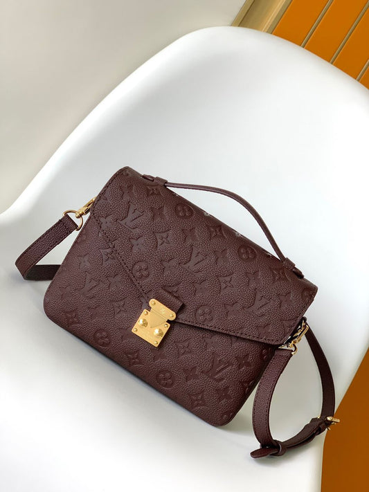 Louis Vuitton Pochette Métis Wine Color