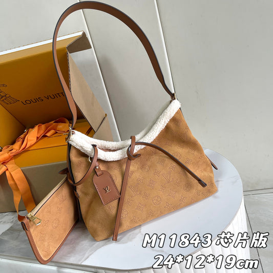 Louis Vuitton CarryAll PM Mahina Suede bag