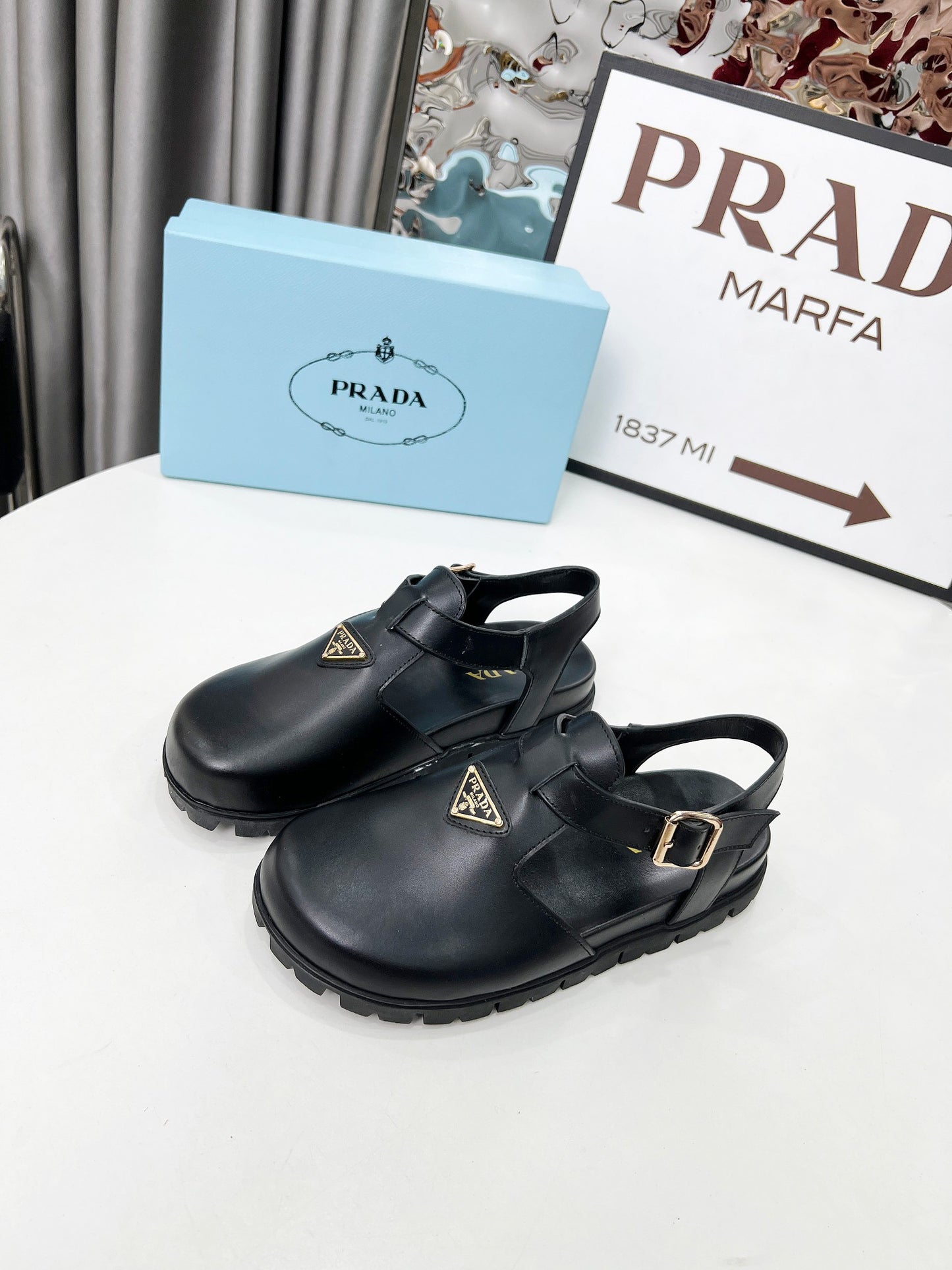 Prada leather clogs