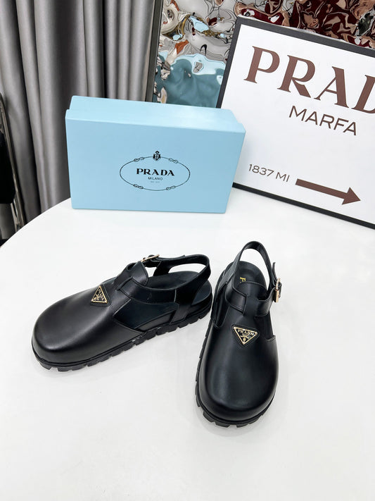 Prada leather clogs