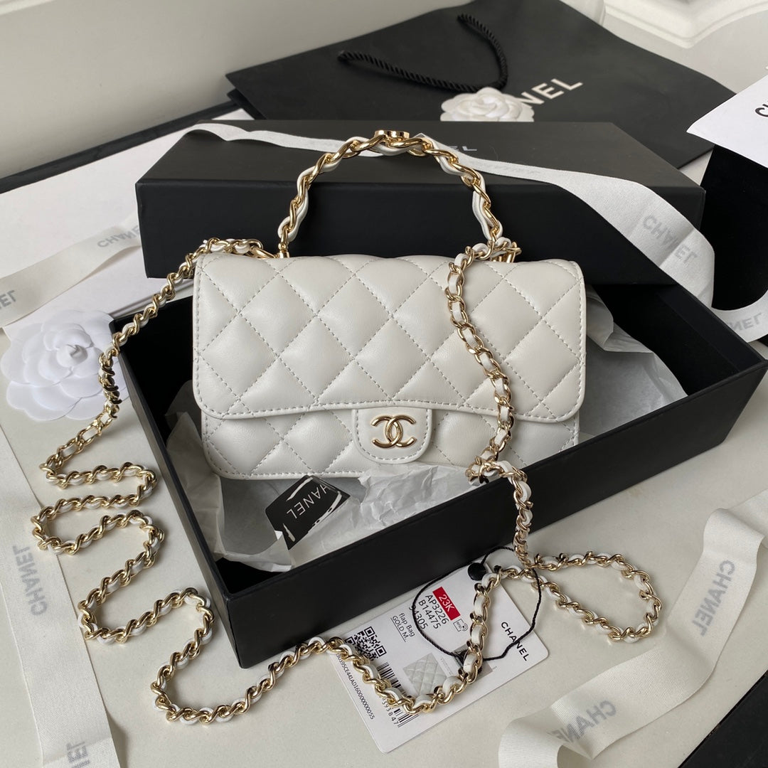 Chanel top handle flap bag