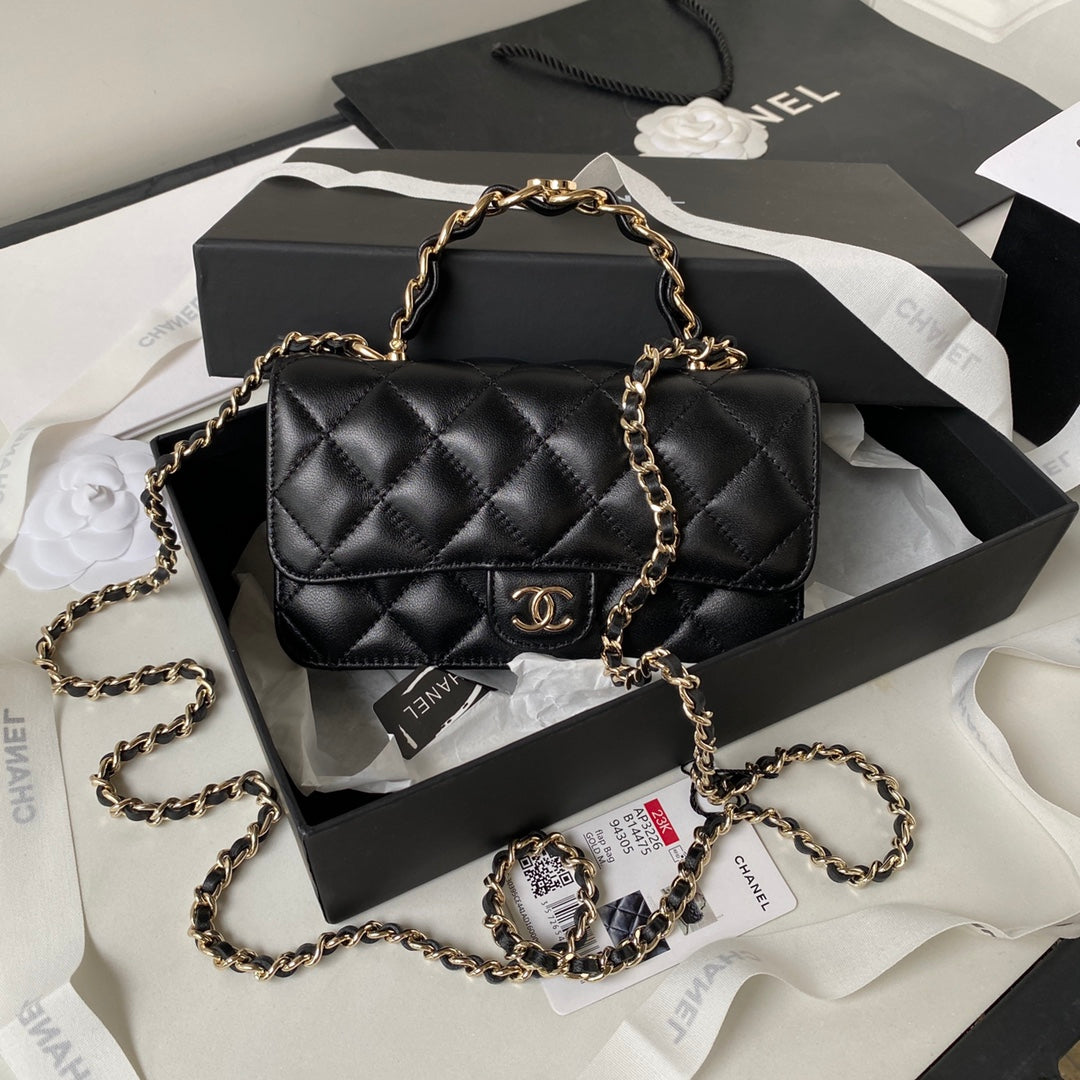 Chanel top handle flap bag