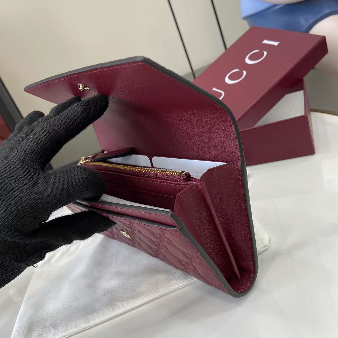 Gucci GG Emblem continental wallet