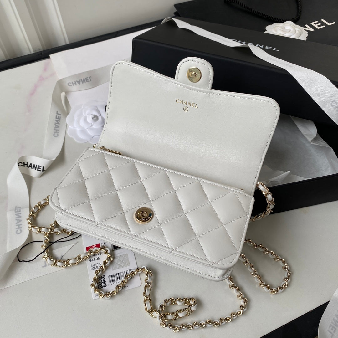 Chanel top handle flap bag