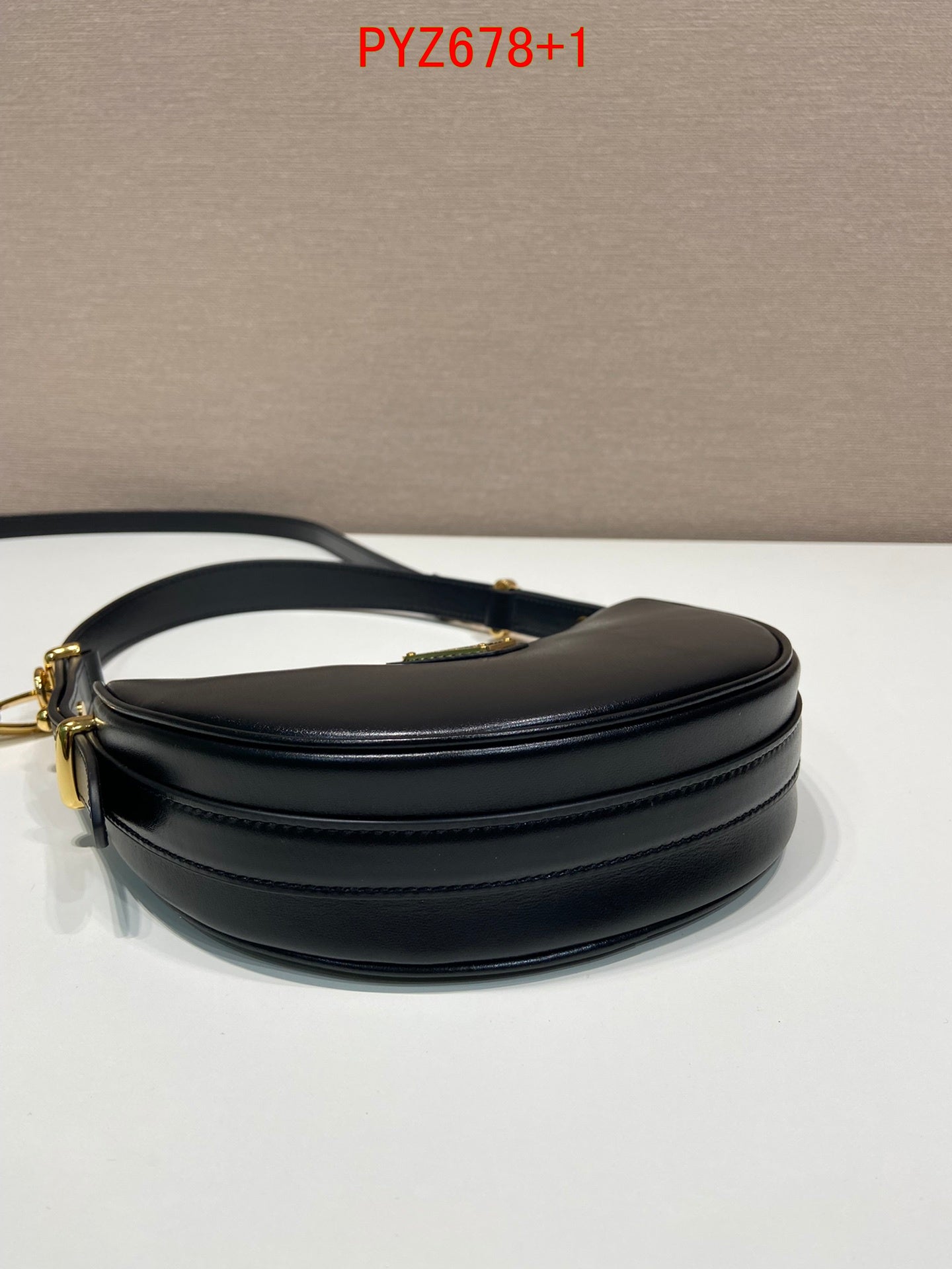 Prada Arqué leather mini shoulder bag