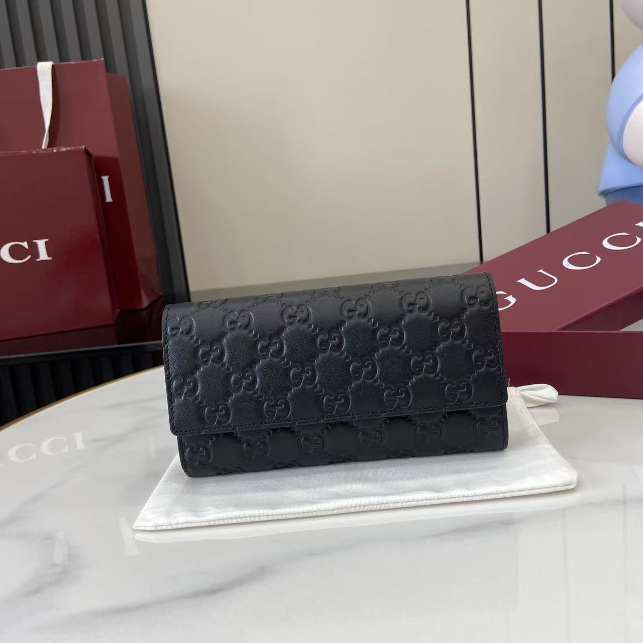 Gucci GG Emblem continental wallet