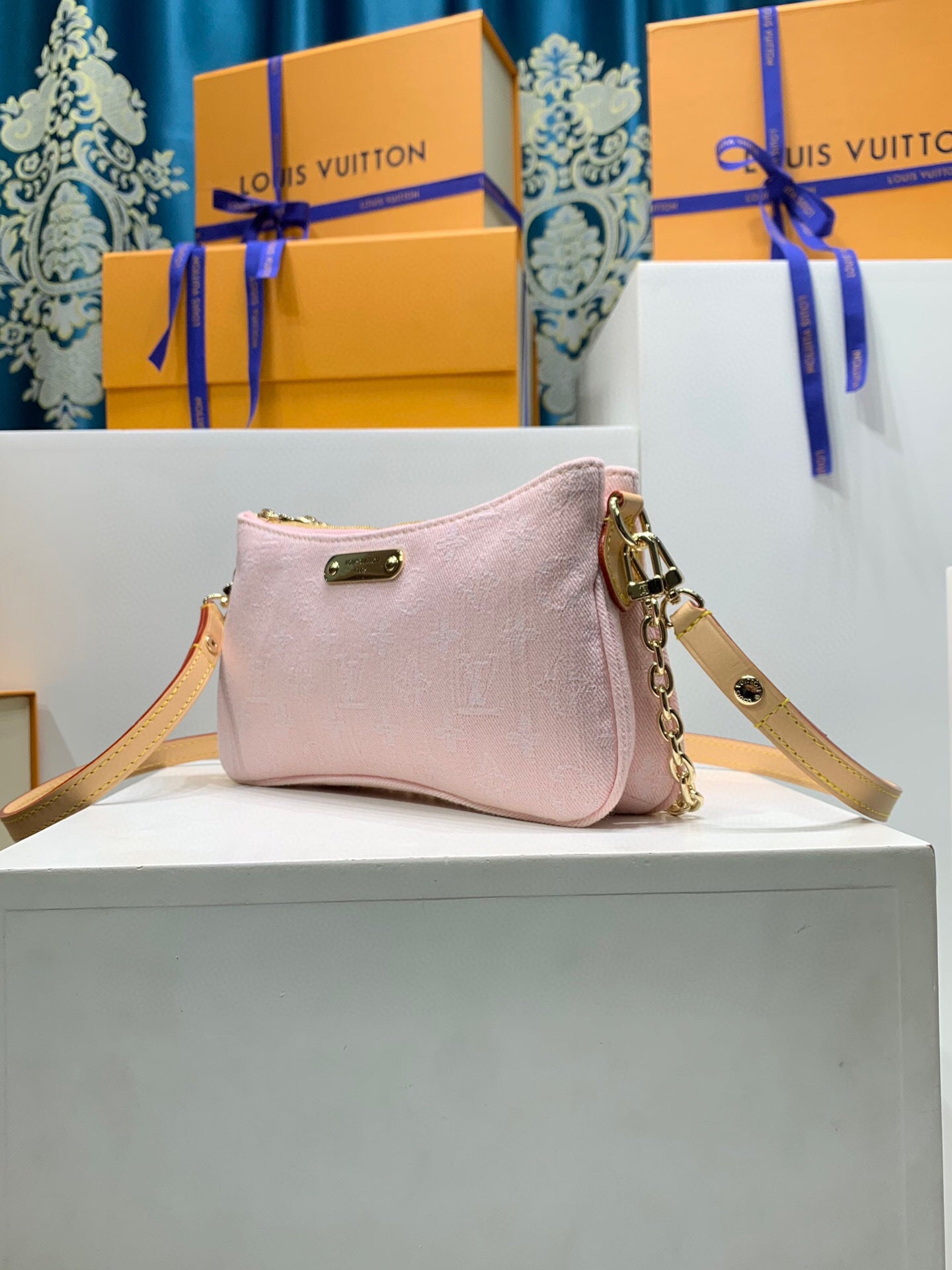 Louis Vuitton Liv Pochette denim pink