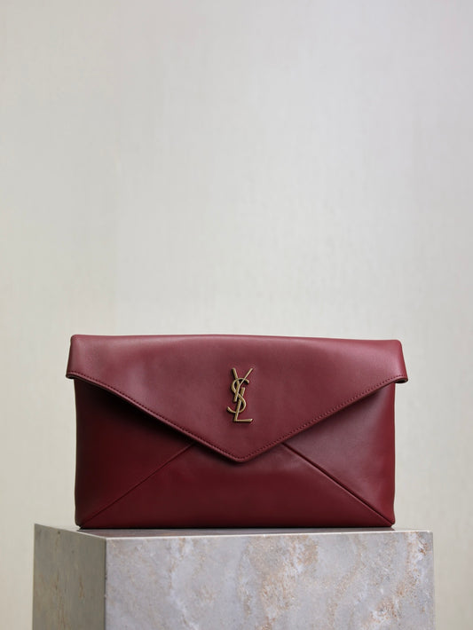 YSL CASSANDRE large envelope pouch in shiny leather