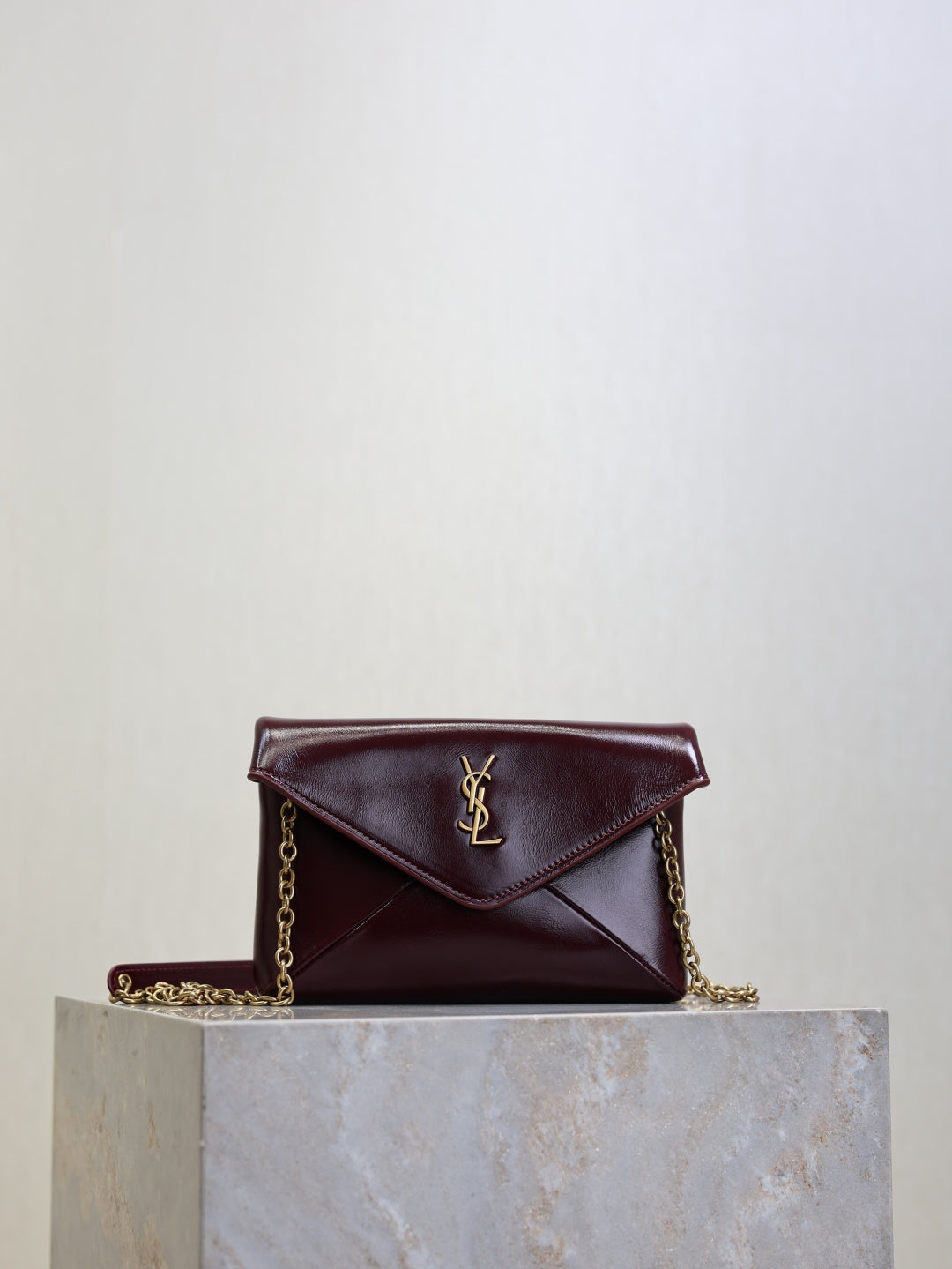 YSL CASSANDRE chain pouch in shiny leather